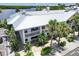 Building's exterior with metal roof and waterfront location at 611 Destiny Dr # 216, Ruskin, FL 33570