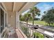 Balcony overlooking parking and trees at 611 Destiny Dr # 216, Ruskin, FL 33570