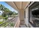Balcony with scenic views of palm trees and streets at 611 Destiny Dr # 216, Ruskin, FL 33570