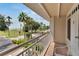 Balcony overlooking a residential street and waterfront at 611 Destiny Dr # 216, Ruskin, FL 33570