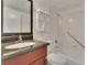 Bathroom with tub, shower, and grab bar at 611 Destiny Dr # 216, Ruskin, FL 33570