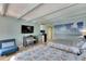 Bedroom with two beds, a TV, and ocean-themed decor at 611 Destiny Dr # 216, Ruskin, FL 33570