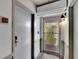 Condo entry with door and screen leading outside at 611 Destiny Dr # 216, Ruskin, FL 33570
