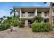 Two-story building exterior with walkway and landscaping at 611 Destiny Dr # 216, Ruskin, FL 33570