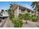 Two-story building exterior with parking and landscaping at 611 Destiny Dr # 216, Ruskin, FL 33570