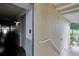 Building hallway with doors to individual condo units at 611 Destiny Dr # 216, Ruskin, FL 33570