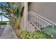 Exterior staircase leading to the condo entrance at 611 Destiny Dr # 216, Ruskin, FL 33570