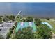 Expansive tennis and pickleball courts overlooking the waterfront at 611 Destiny Dr # 216, Ruskin, FL 33570