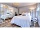 Bedroom with mirrored closet and hardwood floors at 841 4Th Avenue N # 67, St Petersburg, FL 33701