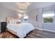 Bright bedroom with hardwood floors and a comfortable bed at 841 4Th Avenue N # 67, St Petersburg, FL 33701