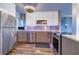 Updated kitchen with stainless steel appliances and wood flooring at 841 4Th Avenue N # 67, St Petersburg, FL 33701