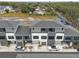 Modern townhouses with 2-car garages, aerial view at 8709 Palm Ranches Pl, Tampa, FL 33614