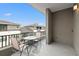 Relaxing balcony featuring chairs and a small table at 8709 Palm Ranches Pl, Tampa, FL 33614