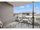 Spacious balcony with seating for lounging and enjoying the view at 8709 Palm Ranches Pl, Tampa, FL 33614
