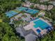 Aerial view of community tennis courts and pool at 10002 Bentley Way, Tampa, FL 33626