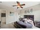 Bedroom with a queen-size bed and ceiling fan at 11550 Biddeford Pl, New Port Richey, FL 34654