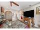 Spacious bedroom with a large TV, built-in wardrobe, and plenty of closet space at 11550 Biddeford Pl, New Port Richey, FL 34654