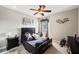 Bedroom with a queen-size bed and ceiling fan at 11550 Biddeford Pl, New Port Richey, FL 34654