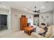 Bonus room with seating area and a ceiling fan at 11550 Biddeford Pl, New Port Richey, FL 34654