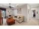Spacious bonus room with comfortable seating at 11550 Biddeford Pl, New Port Richey, FL 34654