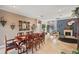 Bright dining room with a large table and access to other rooms at 11550 Biddeford Pl, New Port Richey, FL 34654
