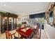 Spacious dining room with French doors leading to the pool area at 11550 Biddeford Pl, New Port Richey, FL 34654