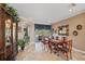 Formal dining room with large windows and pool view at 11550 Biddeford Pl, New Port Richey, FL 34654