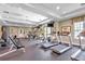 Well-equipped fitness center with treadmills, ellipticals, and weight machines at 11550 Biddeford Pl, New Port Richey, FL 34654