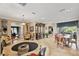 Spacious living room with dining area and hardwood floors at 11550 Biddeford Pl, New Port Richey, FL 34654