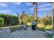 Private patio with seating and grill at 11550 Biddeford Pl, New Port Richey, FL 34654