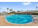 Large community pool with lap lanes and a relaxing atmosphere at 11550 Biddeford Pl, New Port Richey, FL 34654