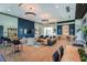 Relaxing community room with comfortable seating and large TV at 12217 Meditation Trl, Venice, FL 34293