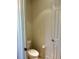 Small half bathroom with toilet and sink at 130 Banyan Bay Dr, St Petersburg, FL 33705