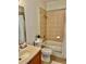 Standard bathroom with a tiled shower-tub combination and neutral finishes at 130 Banyan Bay Dr, St Petersburg, FL 33705