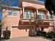 Two-story townhouse with balcony and two-car garage at 130 Banyan Bay Dr, St Petersburg, FL 33705