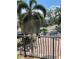 Palm tree on a corner lot with brick-paved streets, sidewalks, and well-maintained landscaping at 130 Banyan Bay Dr, St Petersburg, FL 33705