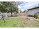 Large backyard with a hammock, swing set, and fence at 14430 10Th. St, Dade City, FL 33523