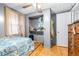 Bedroom with a built-in closet and wood floors at 14430 10Th. St, Dade City, FL 33523