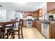 Kitchen with stainless steel appliances and dark wood cabinets at 14430 10Th St, Dade City, FL 33523