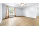 Living room featuring light wood flooring and large window at 14430 10Th. St, Dade City, FL 33523