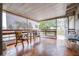 Spacious screened porch with outdoor furniture and view at 14430 10Th. St, Dade City, FL 33523