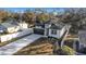 Aerial view of a modern house with a dark-colored garage door at 1696 Wilmar Ave, Tarpon Springs, FL 34689