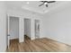 Main bedroom with access to bathroom and walk-in closet at 1696 Wilmar Ave, Tarpon Springs, FL 34689