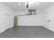 Garage with extra storage space and a new water heater at 1696 Wilmar Ave, Tarpon Springs, FL 34689