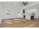 Open concept kitchen with island and stainless steel appliances at 1696 Wilmar Ave, Tarpon Springs, FL 34689