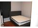 Cozy bedroom with a double bed and wood flooring at 17346 Mint Leaf Ln, Land O Lakes, FL 34638