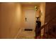 Bright entryway with a staircase and neutral color palette at 17346 Mint Leaf Ln, Land O Lakes, FL 34638