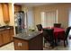 Kitchen island with granite countertops and a breakfast nook at 17346 Mint Leaf Ln, Land O Lakes, FL 34638
