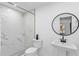 Clean bathroom with marble shower and pedestal sink at 1758 Winfield Cir, Clearwater, FL 33756