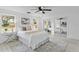 Bright bedroom with mirrored closet doors and a queen bed at 1758 Winfield Cir, Clearwater, FL 33756